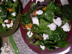 Spinach salad with roasted sweet potato, onions, lentils and feta